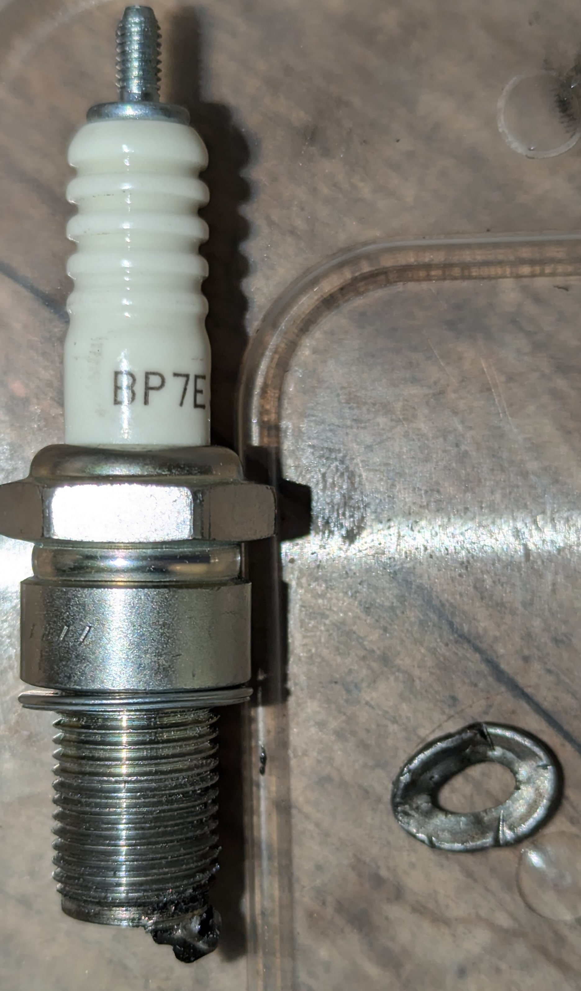 sparkplug and errant washer.jpg