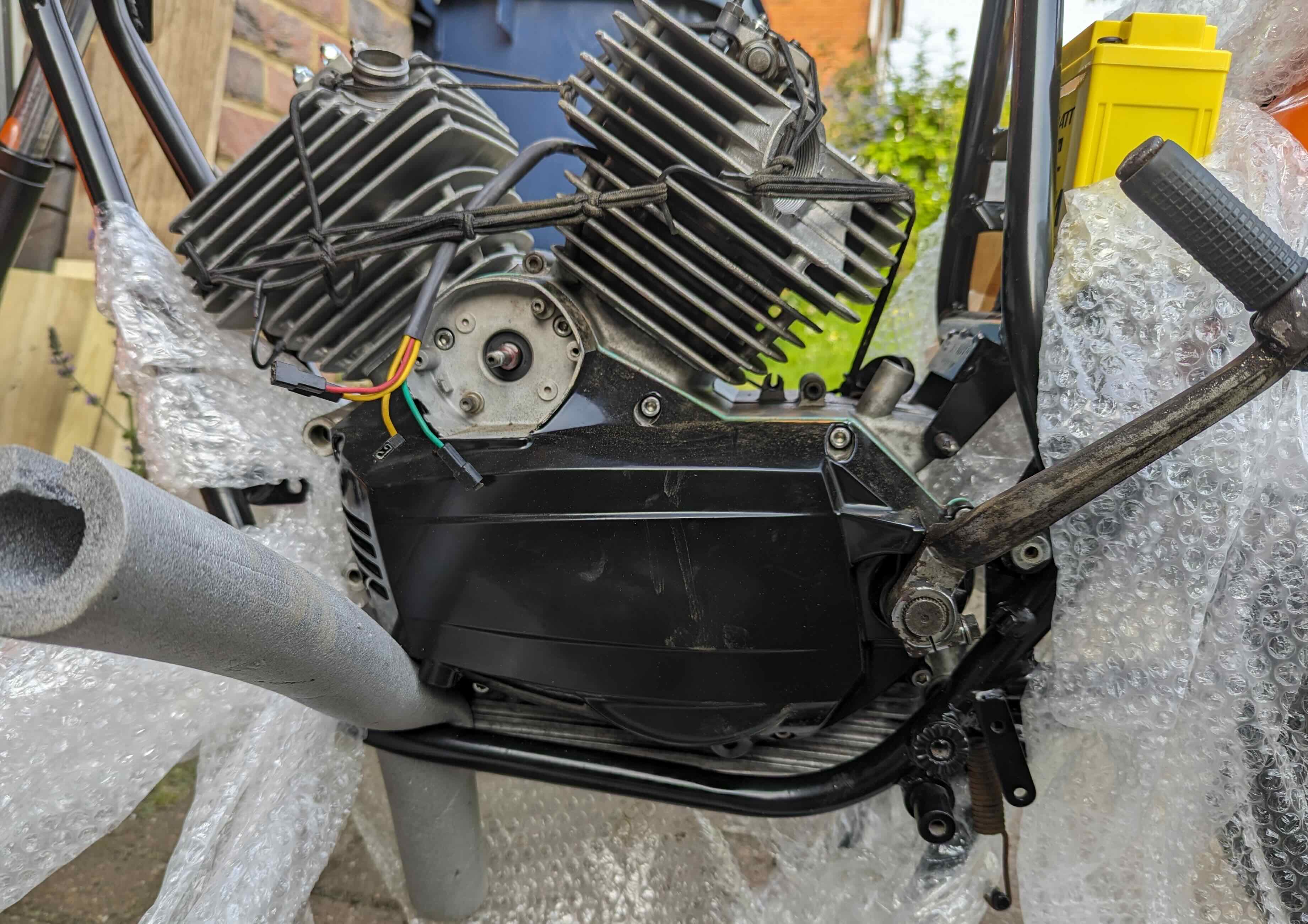 Fitting the 250 2C engine in the frame.jpg