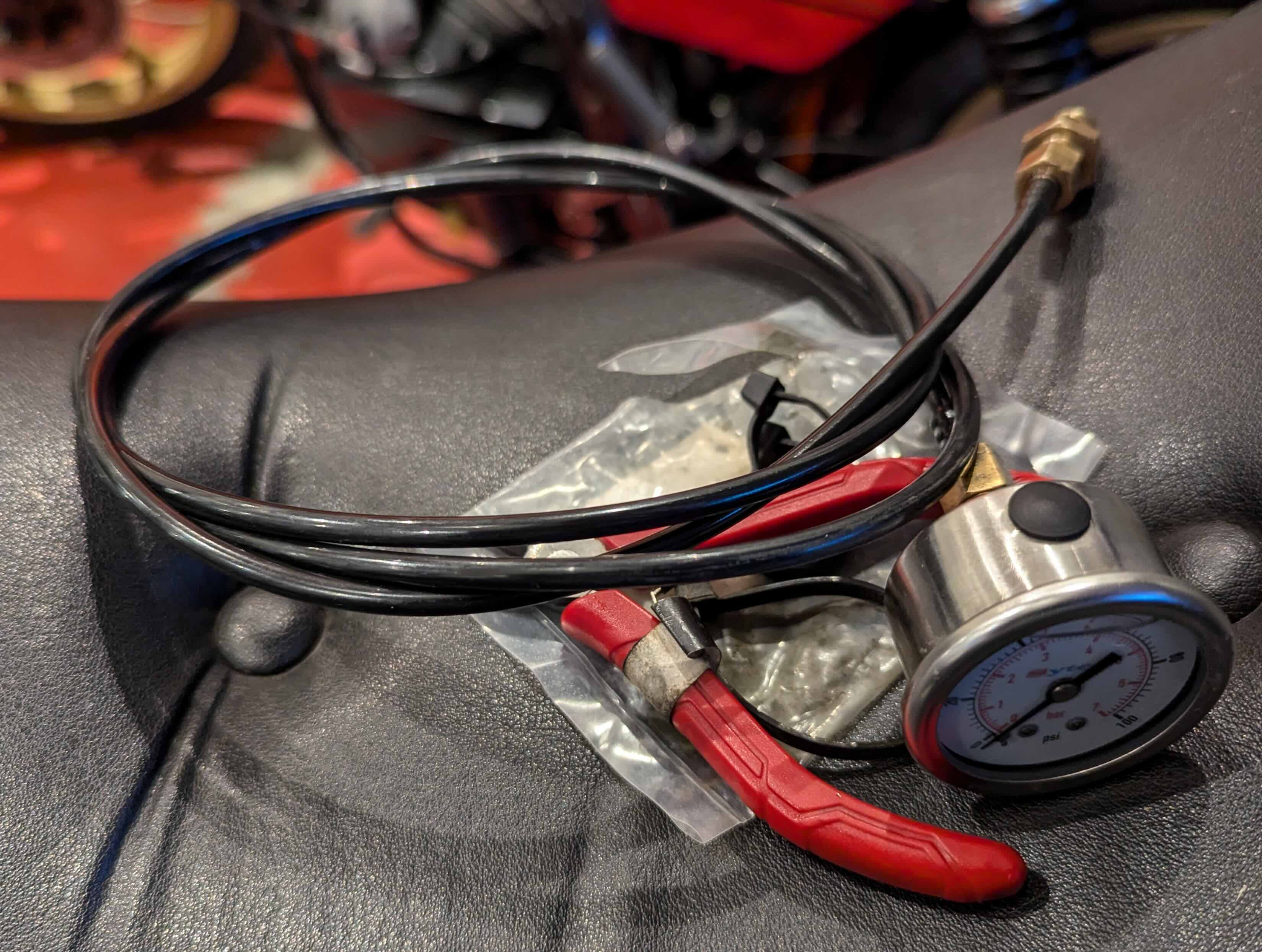 Removed oil pressure gauge with pipe.jpg