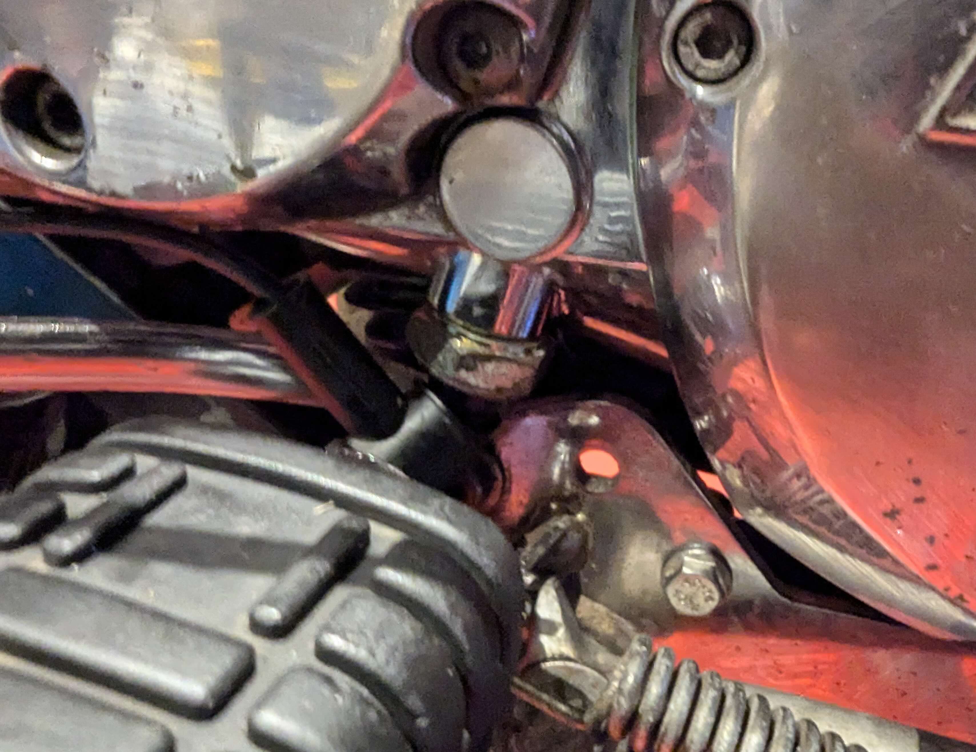 Oil Pressure switch area with footrest.jpg